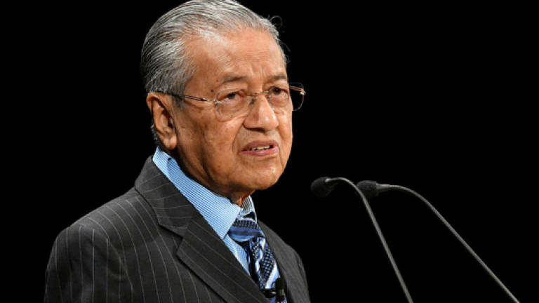Mahathir raises option of changing currency