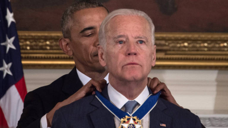 Obama surprises Biden with top civilian honour