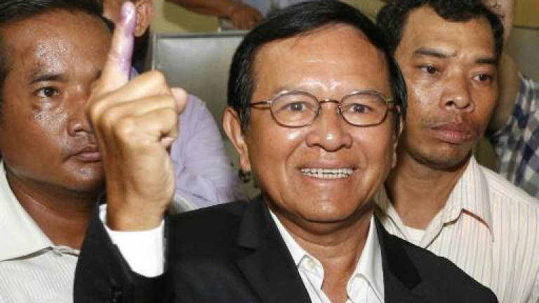 Cambodia opposition leader charged with treason, espionage