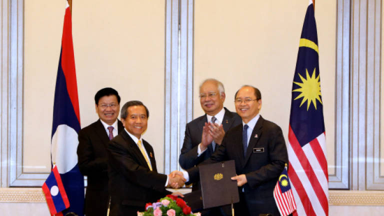 Malaysia, Laos to establish joint committee on STI, ink MoU on STI