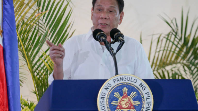 Philippines' Duterte threatens to copy Russia ICC exit