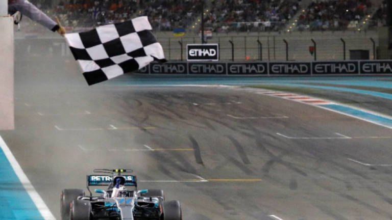 Bottas holds off Hamilton in Abu Dhabi GP