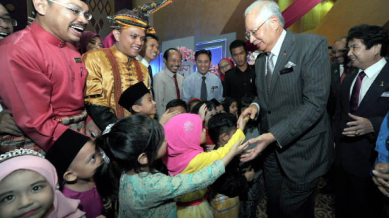 Don't lose focus in serving the rakyat, Najib tells govt servants