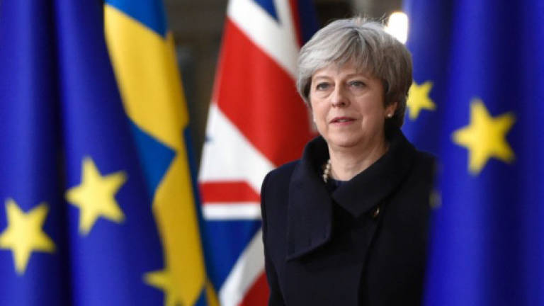 EU opens next Brexit phase, warns of tough talks