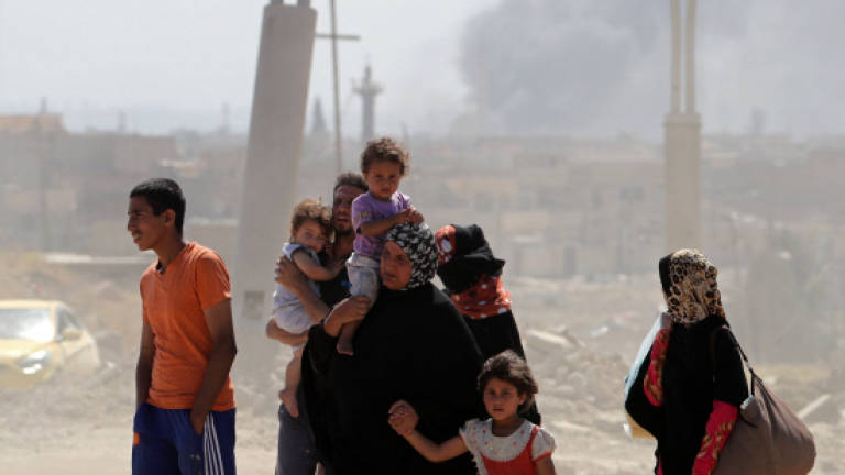 UN reports fresh IS killings, air strike deaths in Mosul