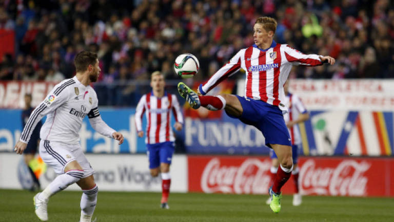 Atletico beat Real Madrid again on Torres's return