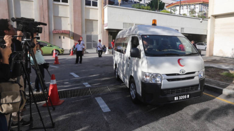 Mortuary van leaves Putrajaya Hospital to HKL for post mortem