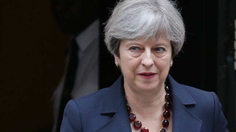 Struggling British PM faces confidence vote