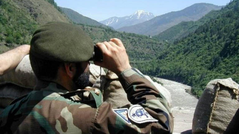 Pakistan says India cross-border fire kills four soldiers