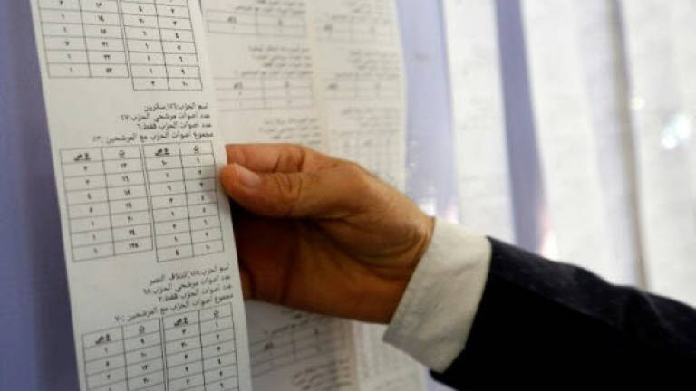 Top Iraq court orders manual election recount (Updated)