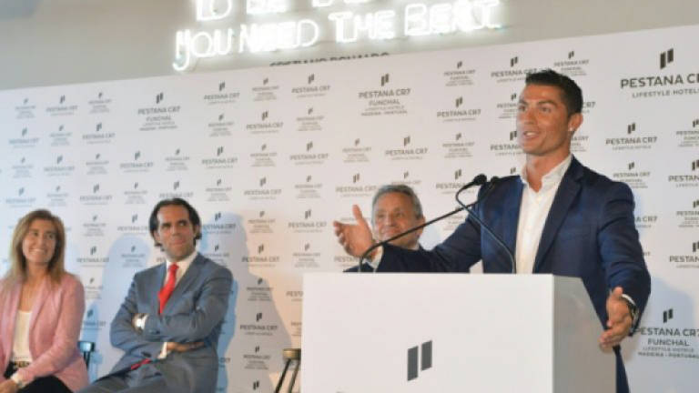 Ronaldo opens own 'CR7' hotel, gives name to airport