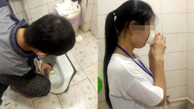Chinese firm punishes workers by making them drink water right out of toilet