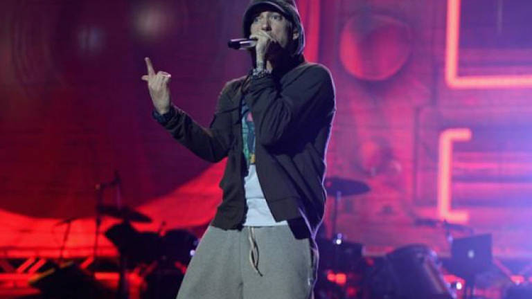 With new album, Eminem finds political voice