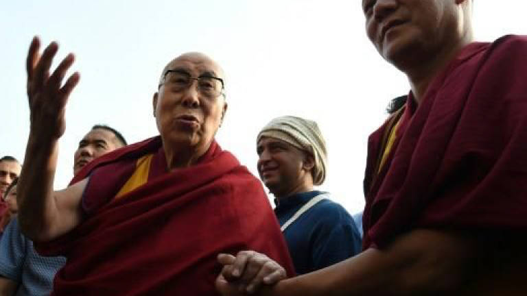 Dalai Lama turns to iPhone to spread app-iness