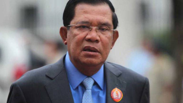 Cambodian PM threatens key rival with prison