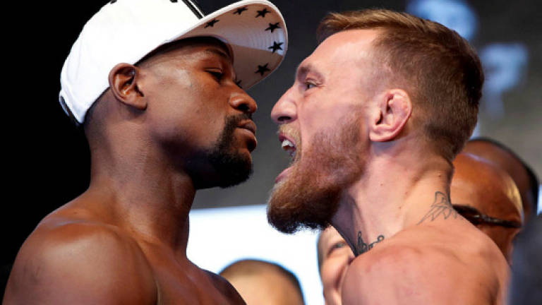 McGregor vows Mayweather knockout as moment of truth nears