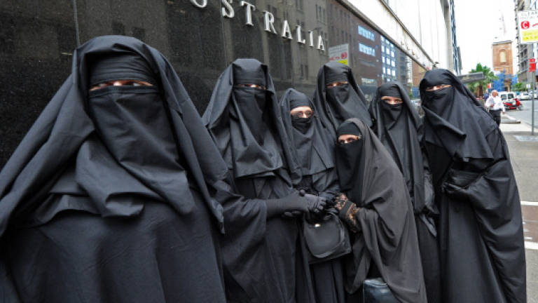 Australia abandons controversial niqab segregation plan