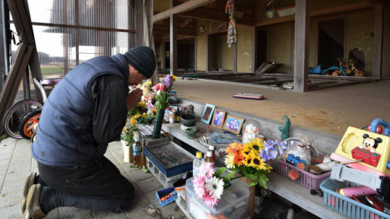 Japan marks 4th anniversary of quake-tsunami disaster