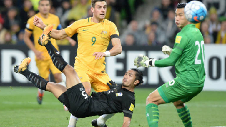 Australia scramble vital win over Thailand