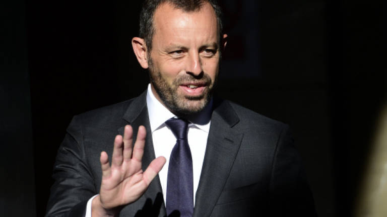 Ex-Barcelona president Rosell held without bail