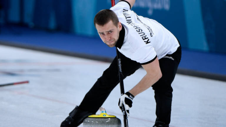 Russian Olympic curler denies knowingly doping, says positive test a 'shock'