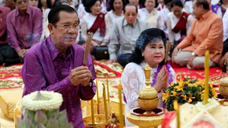 Fortified by family and China cash, Cambodia's strongman digs in