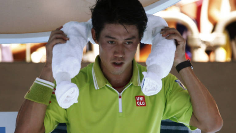 Japan's Nishikori warming to task in Melbourne