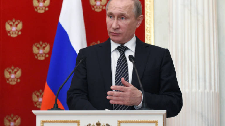 Putin reviews Crimea security after alleged Ukraine raids