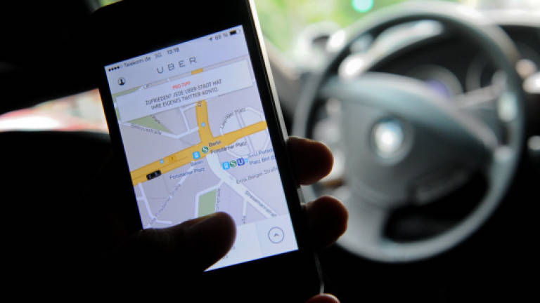 California taxis sue Uber for 'false' safety claims