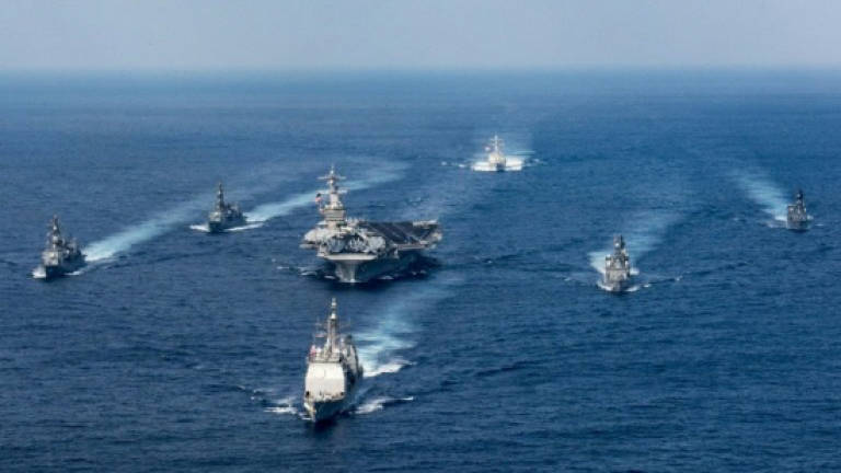 North Korea vows response to 'reckless' US Navy move