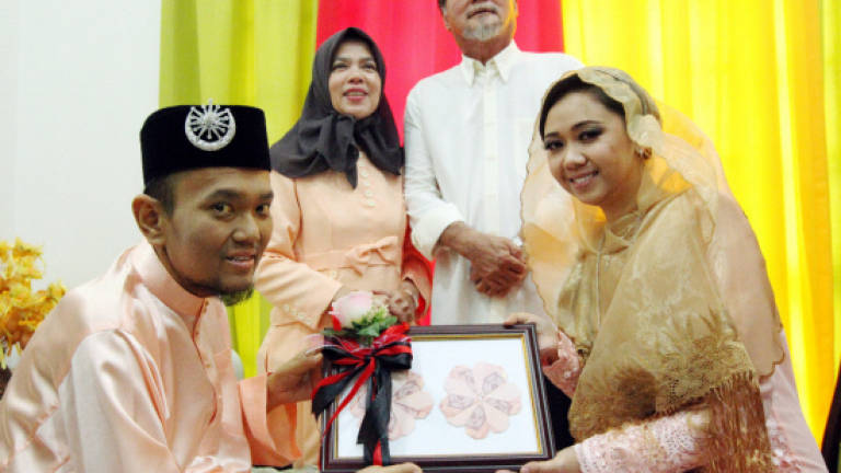 Sarawakian converts, marries sweetheart with stage 4 cancer