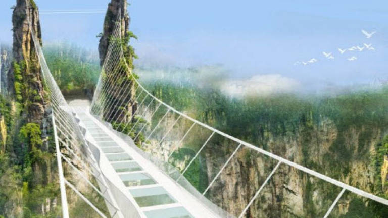 China set to open world's highest glass-bottomed bridge