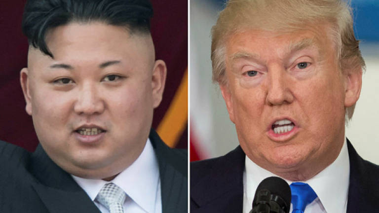 Trump praises N. Korean leader's 'wise' decision to halt Guam missile test