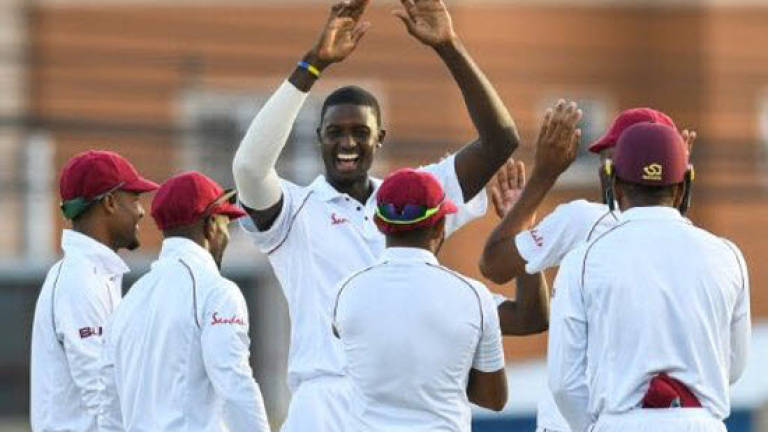 Sri Lanka wilt after Dowrich ton leads West Indies to 414