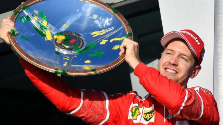 Vettel masters Hamilton to win Australian Grand Prix