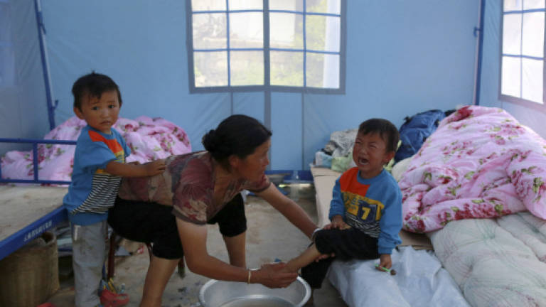 Yunnan quake death toll rises to 410