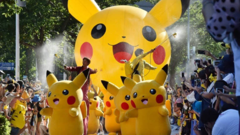 Pikachu parade as Japan goes Pokemon crazy Pikachu parade as Japan goes Pokemon crazy