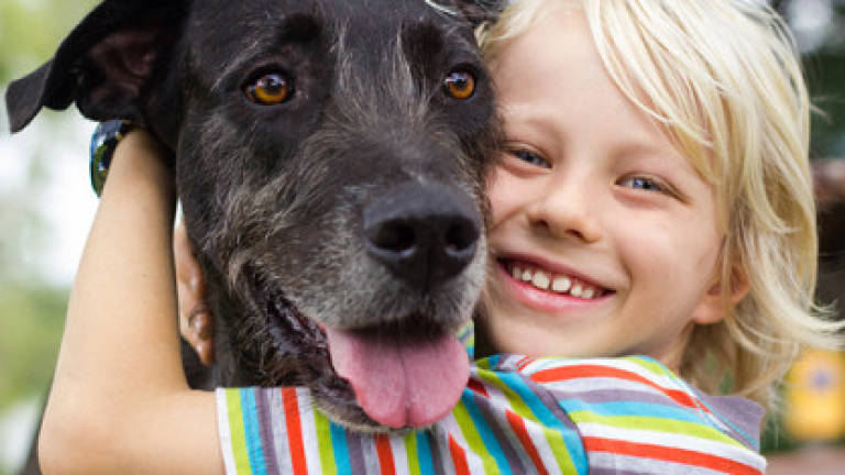 Dogs and kids can be a stress-busting duo