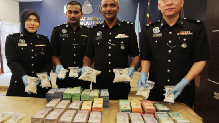 Penang police bust drugs syndicate