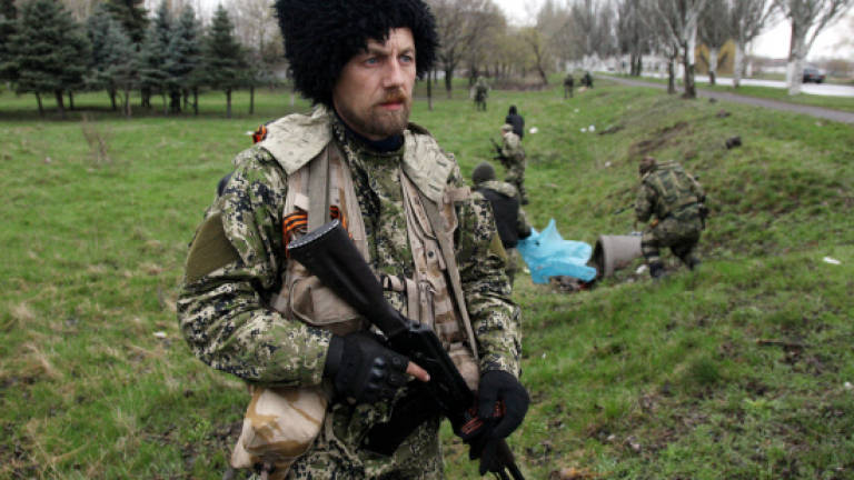 Ukraine turns to force to oust pro-Russian gunmen