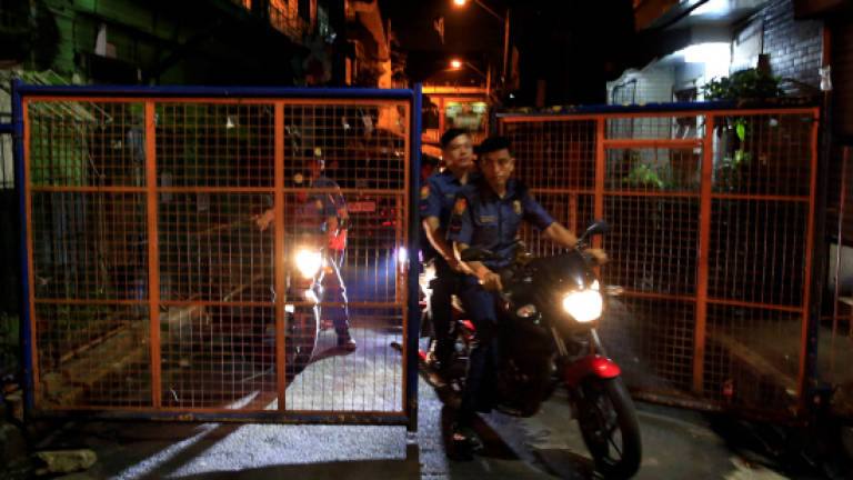 Philippine assassins unmasked as policemen
