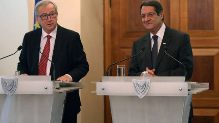 EU's Juncker praises Cyprus recovery after bailout