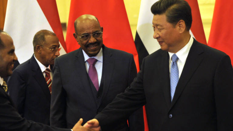China's Xi calls indicted Sudanese leader Bashir 'old friend'