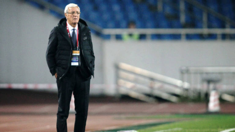 Lippi sees improvement in goal-shy China