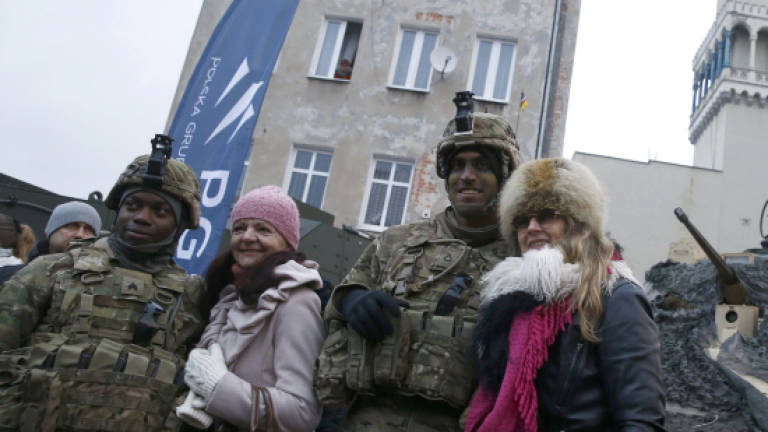 Poles welcome US troops as Nato eyes Russia