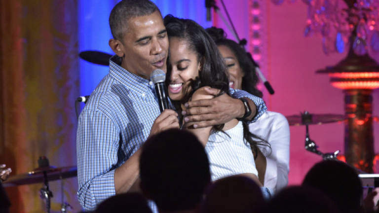 Obama celebrates US military, daughter's 18th birthday on July 4 holiday