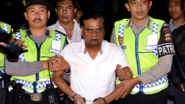 Indian court convicts gangster over journalist murder
