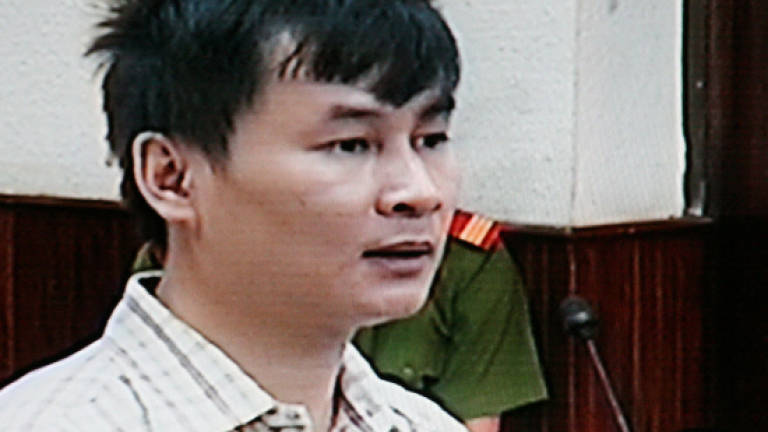 Freed Vietnam dissident heads to US