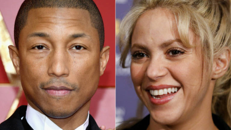 Shakira, Pharrell join anti-poverty concert at G20