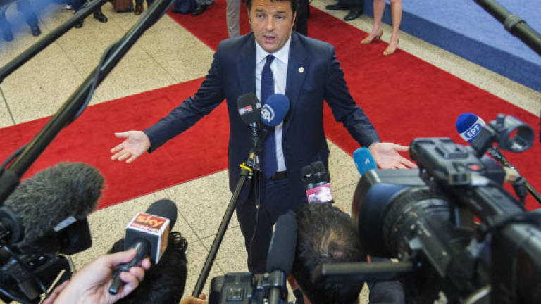Italy's Renzi slams EU leaders over migrant quotas